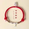 Pulsera tejida a mano con nudo de bambú en color dorado con un diseño simple y de nicho, Lujo ligero, Pulsera de hilo rojo del Año del Caballo
