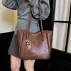Bolsa de mano de gran capacidad, bolsa para el trabajo para mujer, nueva colección otoño/invierno 2026, bolso de hombro casual y versátil, color marrón, tamaño grande