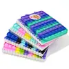 Bobina pop de burbujas de silicona, cuaderno de silicona con orejas, cuaderno de desratización, fabricantes, venta al por mayor