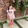 Nuevo conjunto de dos piezas de manga corta para el hogar y el aire acondicionado de verano, pijama de dibujos animados y pantalones de dormir para niñas, estilo de verano fino, talla mediana a grande