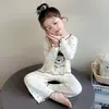 Conjunto de Pijama Infantil Primavera y Otoño 2026, Ropa de Aire Acondicionado de Manga Larga con Dibujos para Niñas, Ropa de Casa de Lunares para Bebé