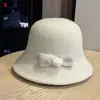 Sombrero de pescador de lana vintage para mujer, sombrero de cubo de lana con lazo, casual y versátil, adelgazante, sombrero de fieltro cálido para mujer