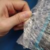 Gran cantidad y excelente precio 10*33 3/30*35 3 bolsa de burbujas con adhesivo fuerte a prueba de golpes bolsa de doble espuma engrosada