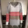 Suéter con capucha tejido para mujer Europeo y Americano de manga larga holgado moderno con costuras de rayas de colores suéter tejido con cordón para mujer