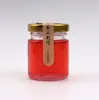 Botellas cuadradas de vidrio de alta transparencia premium para nido de pájaro recién guisado con tapas de hojalata, botellas vacías selladas a medida para suplementos de vejiga natatoria de pescado