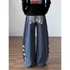 Pantalones casuales de pierna ancha, corte holgado, con estampado retro americano de letras y estrellas, estilo nuevo, para hombre y mujer.