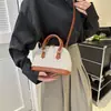 Parche Tejido 2026 Primavera Nueva Moda Tendencia Simple Versátil Bolso de Hombro Cruzado Bolso de Concha