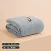 Cor lisa A antibacteriano fleece de coral toalha de banho grande toalha de banho absorvente macia para uso doméstico adulto toalha de banho grande grossa atacado