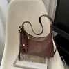 Bolso de media luna minimalista transfronterizo 2026 nueva versión coreana, bolso de axila, bolso de hombro de moda estilo relajado, bolso cruzado casual