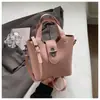 Bolso Único Texturizado Bolso Tote Pequeño para Mujer 2026 Nuevo Bolso Cubo Simple Versátil Bolso de Hombro Cruzado Bolso de Moda