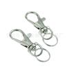 Venta al por mayor puntual Llavero con control remoto Llavero de aleación de zinc antirrobo para coche hebilla de perrito más 14 anillos dobles