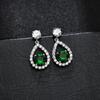 Aretes de circonita con incrustaciones de cobre AAA redondos chapados en platino aretes clásicos para mujer venta directa de fábrica aretes con pasador de plata de ley 925