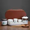 Juego de té de porcelana blanca Dehua con tetera y cuatro tazas, portátil para uso en exteriores, un regalo lujoso y de alta gama