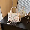 Bolsa feminina de nicho de alta qualidade transfronteiriça 2026 nova moda bolsa tiracolo estampada, bolsa de balde de mão super popular