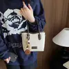 Bolso de cubo retro transfronterizo para mujer, 2026, de alta gama, elegante y moderno, adecuado para el trabajo diario, se puede llevar en la mano o usar como bolso de hombro o bolso cruzado