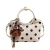 Bolso cubo de ante con lunares estilo coreano súper popular y versátil para mujer, nuevo modelo 2026, bolso de hombro y cruzado moderno y a la moda para el trabajo