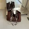 Bolso versátil de moda transfronterizo para mujer, nuevo bolso tote retro casual de otoño 2026, bolso de hombro súper popular para el día a día, bolso de axila
