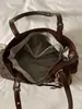 Bolso tote de lunares de nicho de estilo coreano muy elegante, nuevo modelo otoño 2026, bolso de hombro casual de gran capacidad para el trabajo y los desplazamientos
