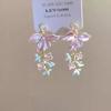 Pendientes colgantes vintage de cereza roja vino para mujer, nuevos pendientes de diseño de borlas exquisitos de otoño e invierno 2024.