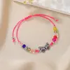 Pulsera tejida de mariposa al por mayor transfronterizo, pulsera de cuentas para parejas y amigos, pulsera de cordón de cera ajustable con mariposa de aleación