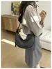 Nova bolsa carteiro de bolinho transfronteiriça para mulheres, bolsa de ombro única e transversal, versão coreana, casual e versátil, bolsa de moda feminina em couro PU macio