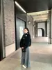 Falda midi plisada tejida de pelo de mapache engrosado para mujer, nuevo estilo otoño/invierno 2026, versátil, adelgazante, con una caída fluida y un dobladillo ancho, a la moda
