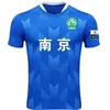 2025 Novo Jiangsu 25-26 Cidade Futebol Fãs Super Escoceses Camisetas de Time Uniforme de Time Camiseta de Manga Curta