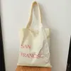 Bolsa de Lona Estilo Coreano Ins para Mujer, Bolso Versátil de Hombro Cruzado, Nuevo Modelo 2026, Bolso de Viaje con Encaje de Lazo