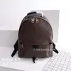 Mochila de Cuero Original Guangzhou Flor Antigua Hombro Cruzada Portátil tamaño pequeño Mochila Unisex Moda Casual Bolso Escolar