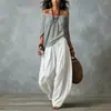 2026 Conjunto de mujer transfronterizo europeo y americano Amazon TK nuevo top largo holgado de hombros descubiertos + pantalones de campana