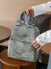 Mochila Nova para Estudantes Outono 2026 Transfronteiriça Mochila de Viagem Portátil de Grande Capacidade Mochila Versátil e Fashion