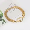 Pulsera de cadena hueca de acero inoxidable de temperamento de nicho europeo y americano para mujer, pulsera de corazón, joyería electrochapada que no se decolora