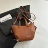 Bolso Cubo Estilo Nuevo Simple Retro Bolso Casual de Moda 2026 Otoño Nuevo Estilo Bolso de Hombro Cruzado Texturizado para Mujer