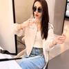 Celebridad de internet de moda cárdigan blanco abrigo corto de manga larga traje top para mujer moderno bordado jeans de trapeador