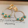 Aretes de Aguja Plateada con Diamantes y Diseño Redondo Irregular, Estilo Vintage, Lujo Ligero y Sensación de Alta Gama