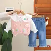 Traje de estilo extranjero para niñas primavera 2025 nuevo para niños bebé primavera y otoño moda flor tridimensional manga larga conjunto de tres piezas