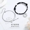 Pulsera de pareja de avión de papel Runxin para hombres y mujeres un par de amor a larga distancia regalo creativo cuerda de mano tejida a mano coreana