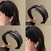 Diadema irregular de ala ancha estilo coreano para mujer, nuevo modelo 2026, diseño de copa alta para hacer que la cara parezca más pequeña, accesorio para el cabello elegante y versátil