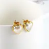 Pendientes de perlas en forma de corazón, nuevos y de moda, pendientes de Joker de Corea, accesorios de ropa, fabricantes de joyas, venta directa.