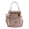 Bolsa Bucket Borboleta Colorida Contrastante Retrô Feminina 2025 Design de Nicho Bolsa Cilindro Portátil Textura Fashion Bolsa de Ombro Transversal