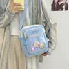 La bolsa popular para mujer de este año 2024 nuevo modelo bolso de hombro versión coreana bolso cruzado de color dulce en bloques de color tela de nailon comercio exterior