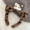 Bonita diadema de gato con orejas de gato de piel negra, diadema de peluche de leopardo, accesorios para el cabello de dibujos animados.