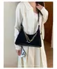 Bolso de gamuza de moda para mujer, nueva colección otoño/invierno 2026, un bolso de hombro con cadena súper popular y único, perfecto para llevar a todas partes