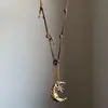 Collar Colgante Luna Dorada Estrella de Ocho Puntas Diseño de Nicho Cadena Larga de Suéter Moda Retro Collar Personalizado para Mujer