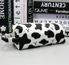 Estuche de Lápices Nuevo Diseño Cuadros Transfronterizo, Bolsa de Maquillaje Portátil, Estuche de Lápices Estudiante Gran Capacidad Estampado de Vaca