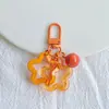 Estrella Hueca de Cinco Puntas Acrílica Campana Hebilla de Puerta de Llave Llavero Cabeza de Bolso Cubierta de Auriculares Colgante Pequeño Decorativo Joyería Colorido