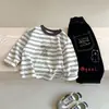 Camiseta informal de manga larga a rayas con estampado de dibujos animados estilo coreano y bloques de color, para niños y niñas, para primavera y otoño