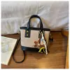Bolso de Cubo Retro de Nicho para Mano para Mujer Otoño/Invierno 2025 Nuevo Bolso Cruzado con Bordado de Hilo Acolchado de Diamantes Bolso de Hombro Único para el Trabajo y el Trayecto