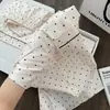 Pijama de verano fino de seda helada para mujer, estilo coreano, dulce y elegante, cárdigan de lunares, shorts de manga corta, ropa de casa moderna, se puede usar afuera