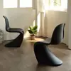 Sillas de comedor apilables estilo nórdico para uso doméstico, sillas de reunión de diseño simple, sillas de respaldo de plástico de moda, sillas Panton, sillas de tocador